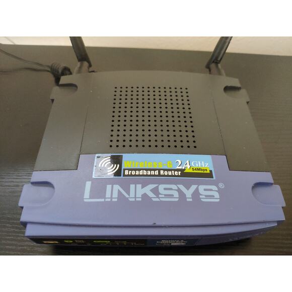 Linksys Wireless Router 4-Port Switch, Model No. WRT54GL - Picture 1 of 5